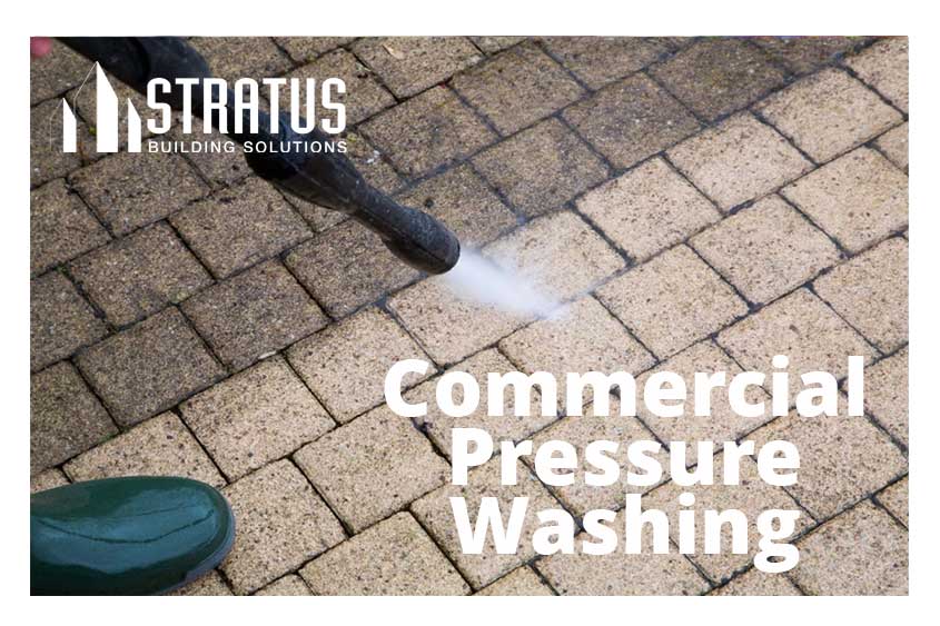 Image Alt Tag: A person pressure washing red pavers with text reading “Commercial Pressure Washing” with a Stratus logo